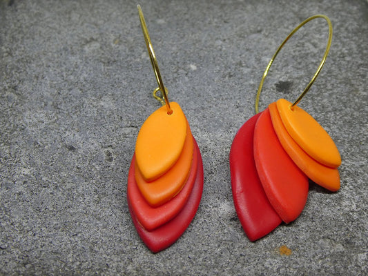 Hoop earring with red and orange leaves