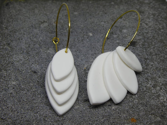 Hoop earring with white leaves
