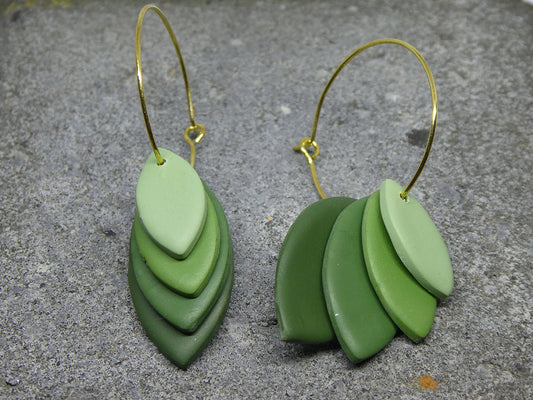 Hoop earring with green leaves